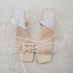 Stylish Beige Sandals with Floral Accents